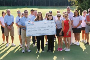 South Arkansas Regional Hospital Group holding check